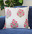 Artisan hand block printing fabric using carved wooden block and natural dyes