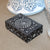Midnight Lotus Soapstone Jewelry Box – Hand-Carved Black Keepsake with Circular Floral Motif